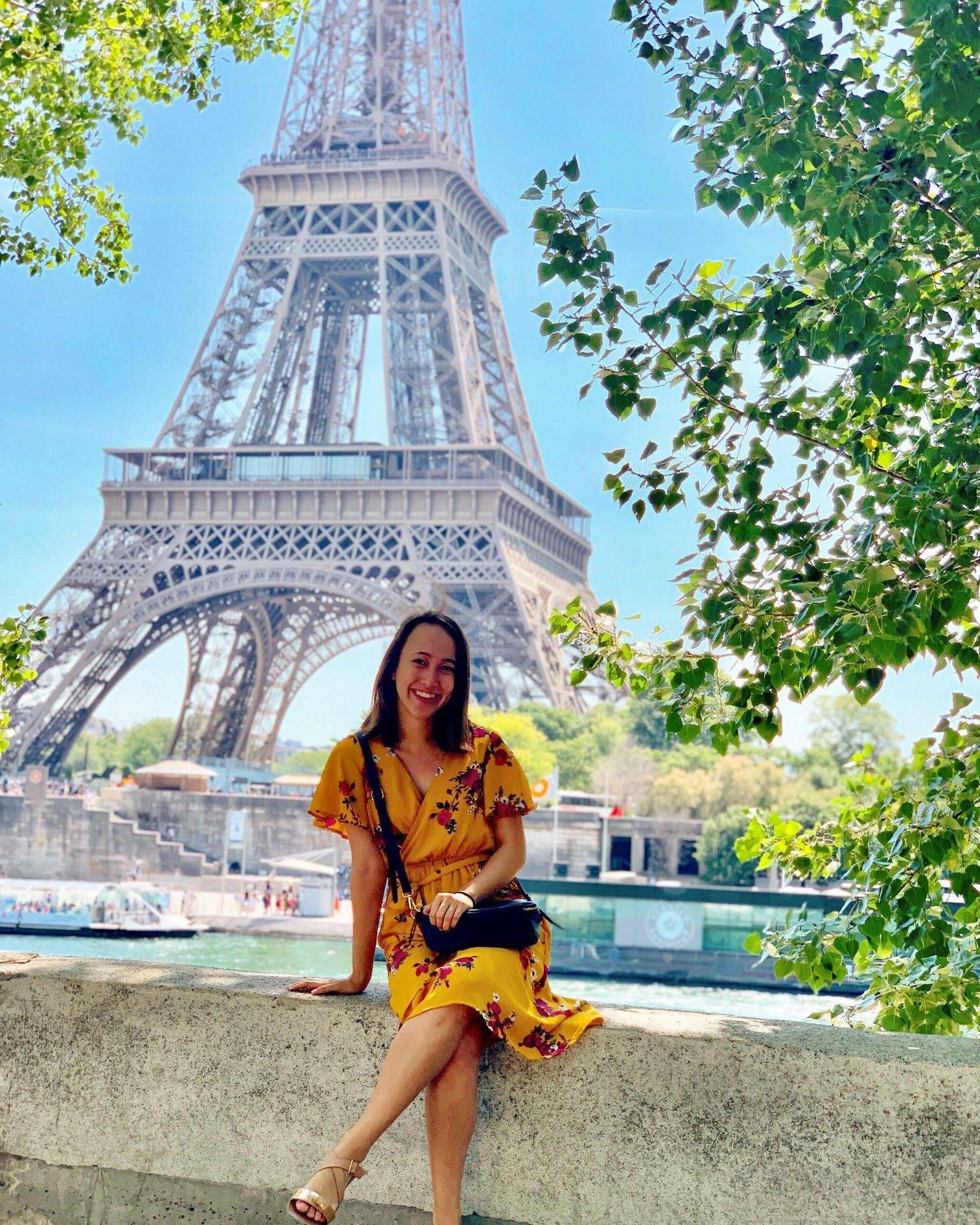 student in front of Eiffel Tower