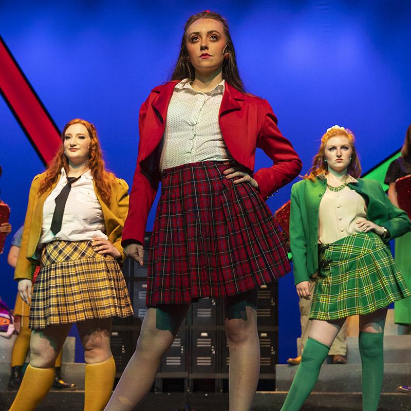 students on stage in Heathers